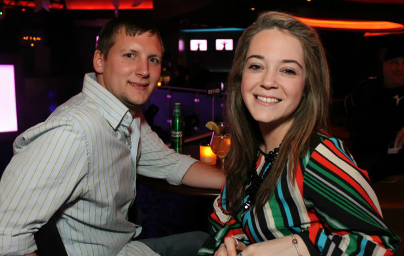 Couple sitting at a table in Vapor